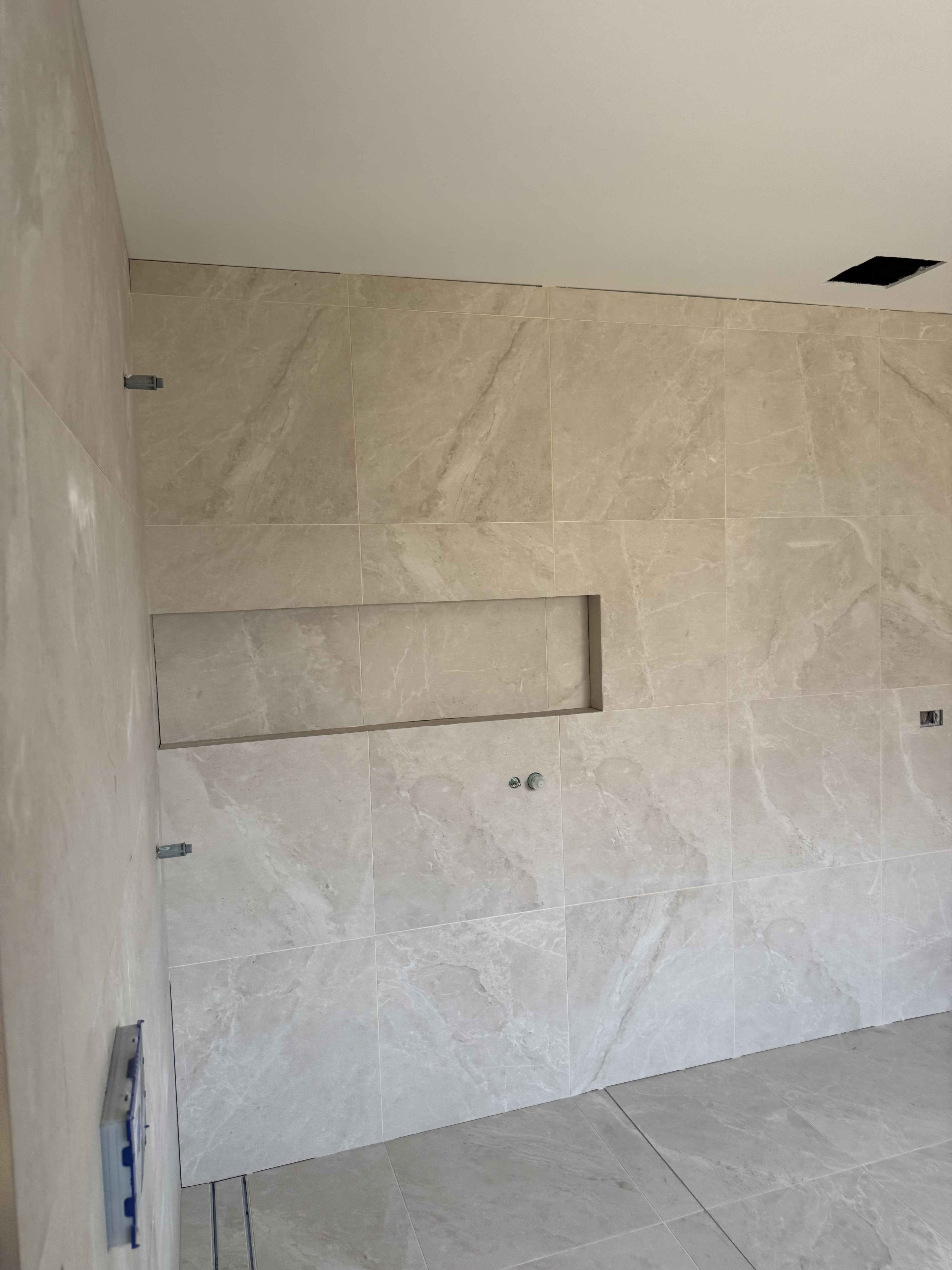 Luxury beige bathroom tiling project in Melbourne, Victoria - gallery photo