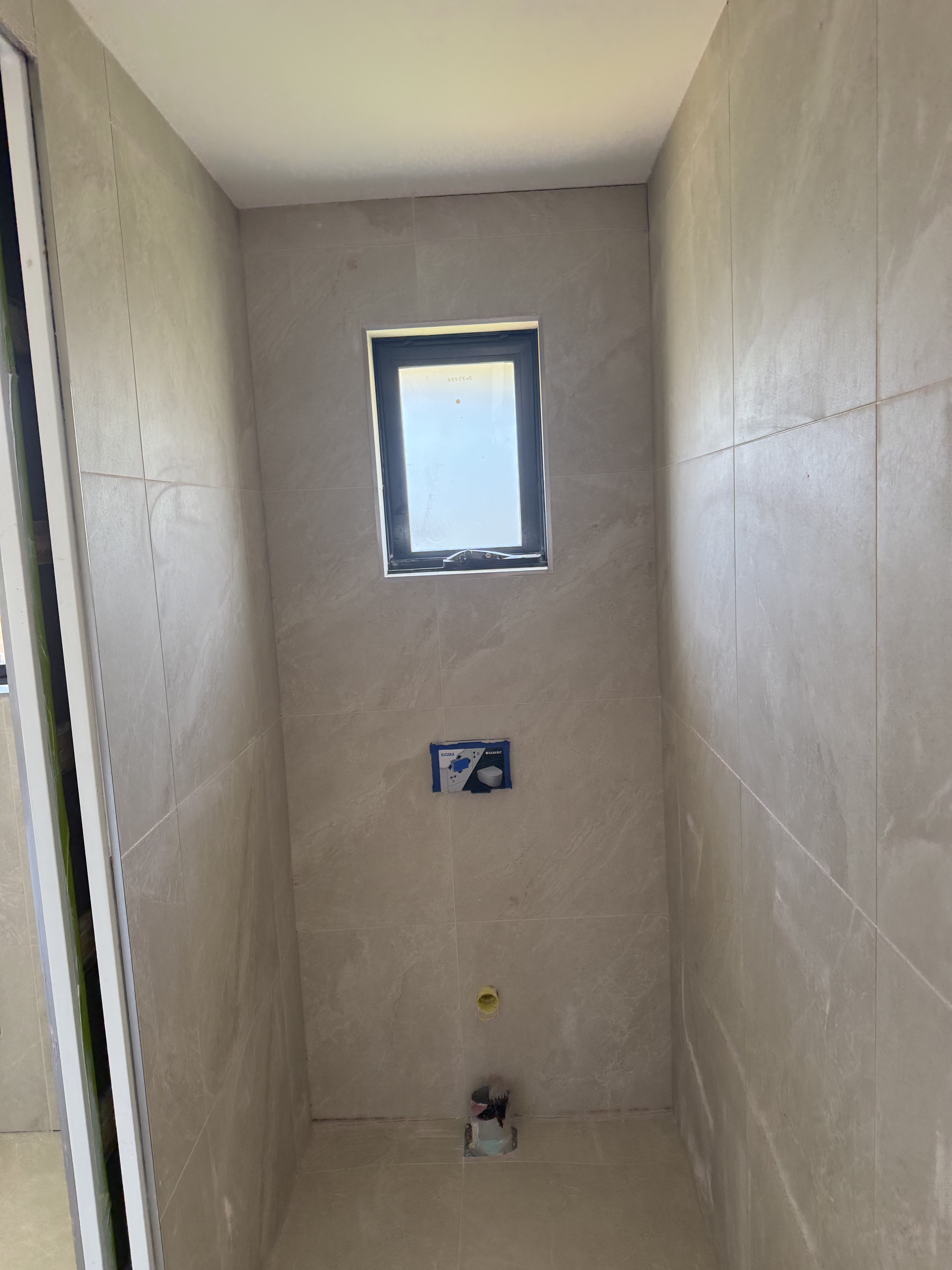 Luxury beige bathroom tiling project in Melbourne, Victoria - gallery photo