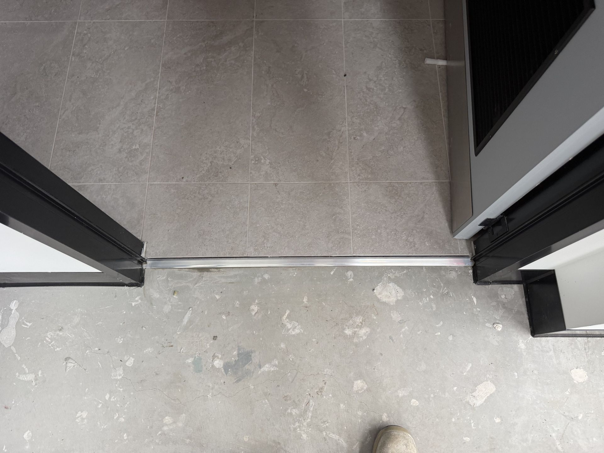 Epping Shower Drain Threshold Tiling - gallery photo