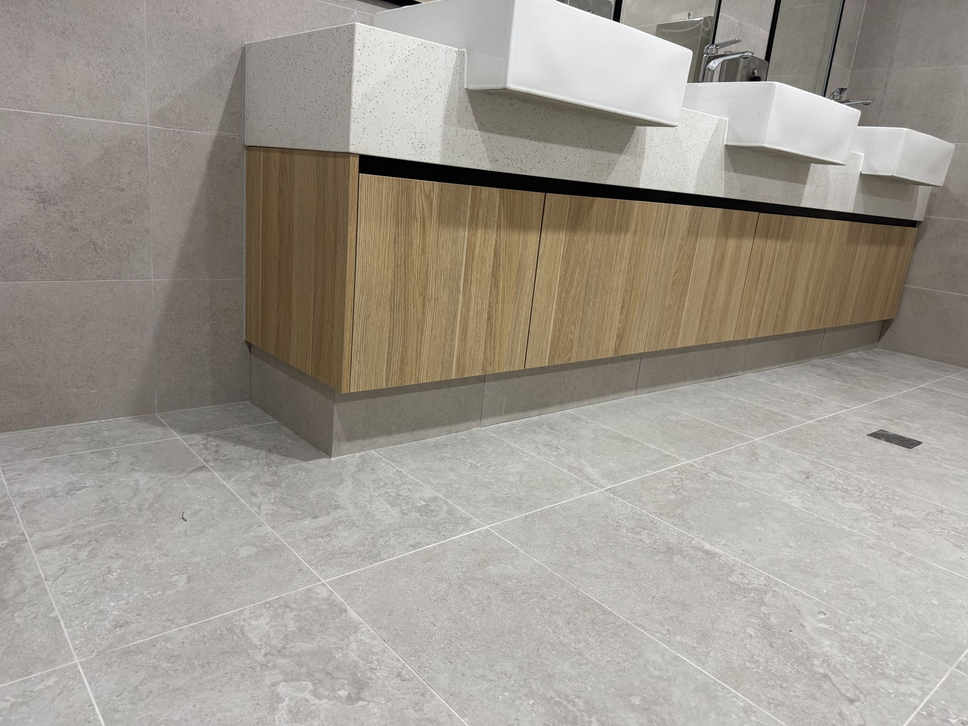 Epping Shower Drain Threshold Tiling - gallery photo